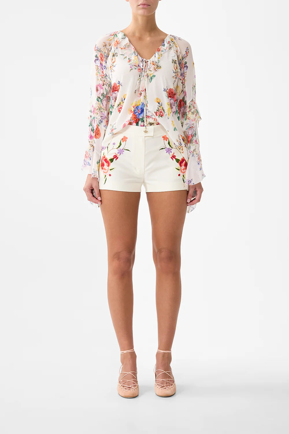 Lace up v-neck blouse with cascade ruffles