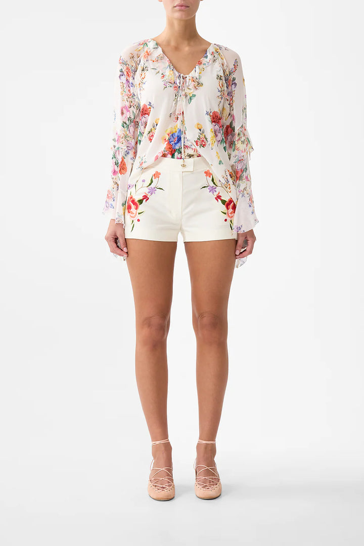 Lace up v-neck blouse with cascade ruffles